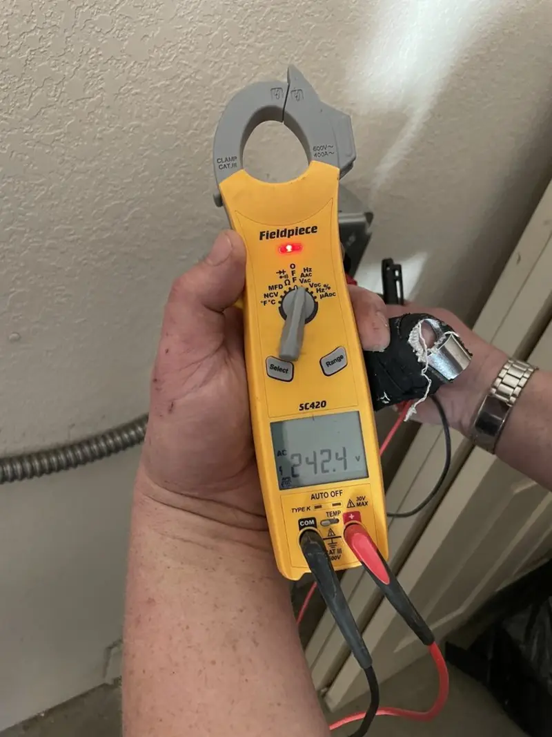 Voltage testing with clamp meter during Aluminum Wiring Replacement in West Jordan